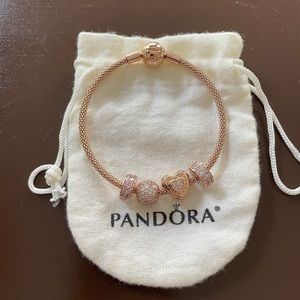 Pandora Rose Gold bracelet with charms/clips